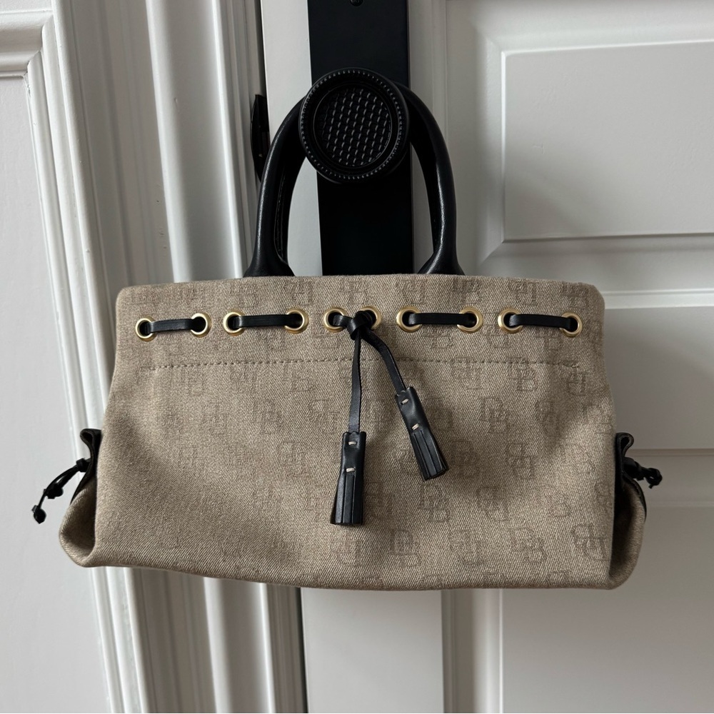 Dooney & Bourke Vintage Beige Canvas Handbag with Black Accents